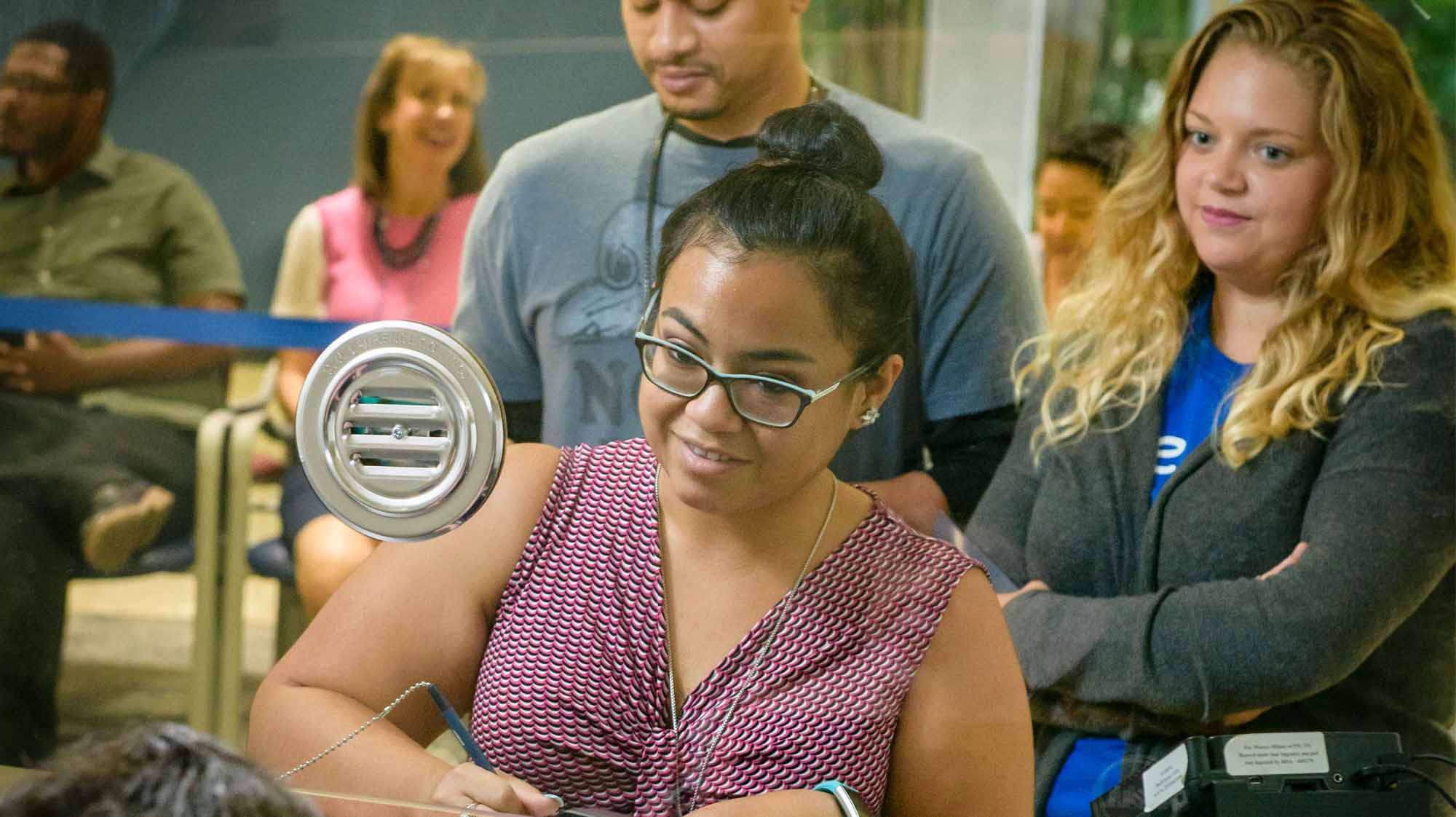 Student receiving information at Financial Aid