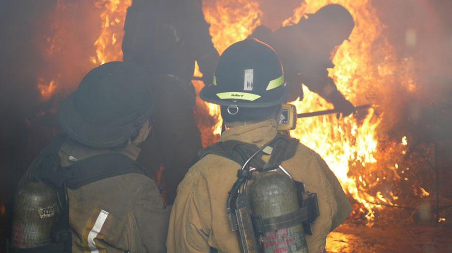 Students performing practical exercises Fire Academy