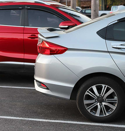 Cars in parking spaces.