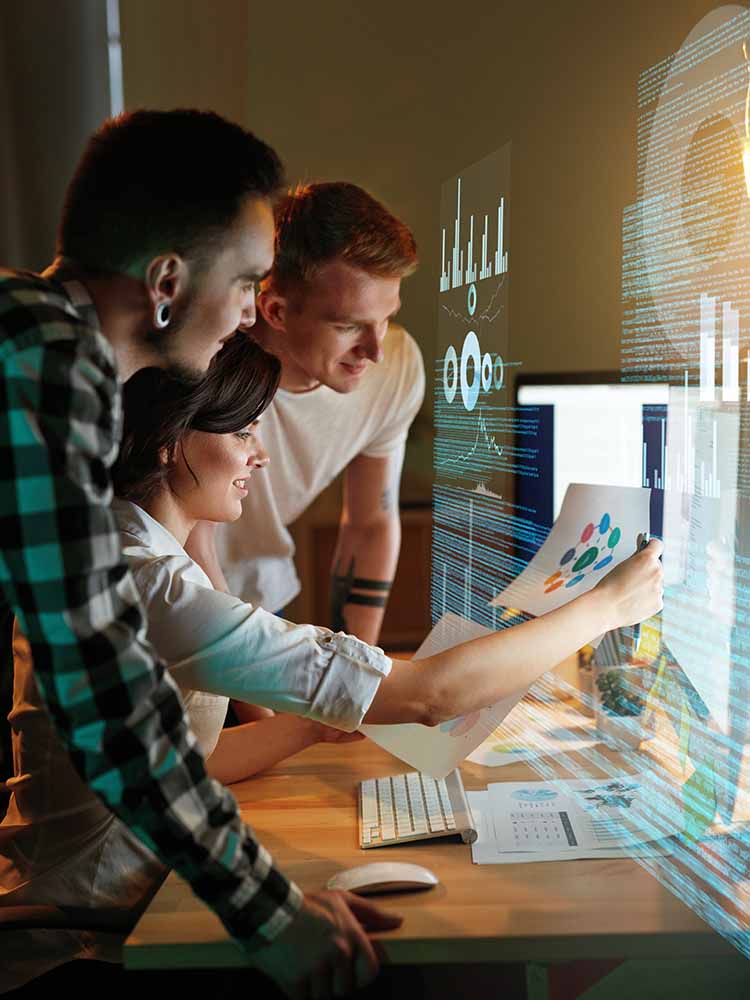Group of coders at desk