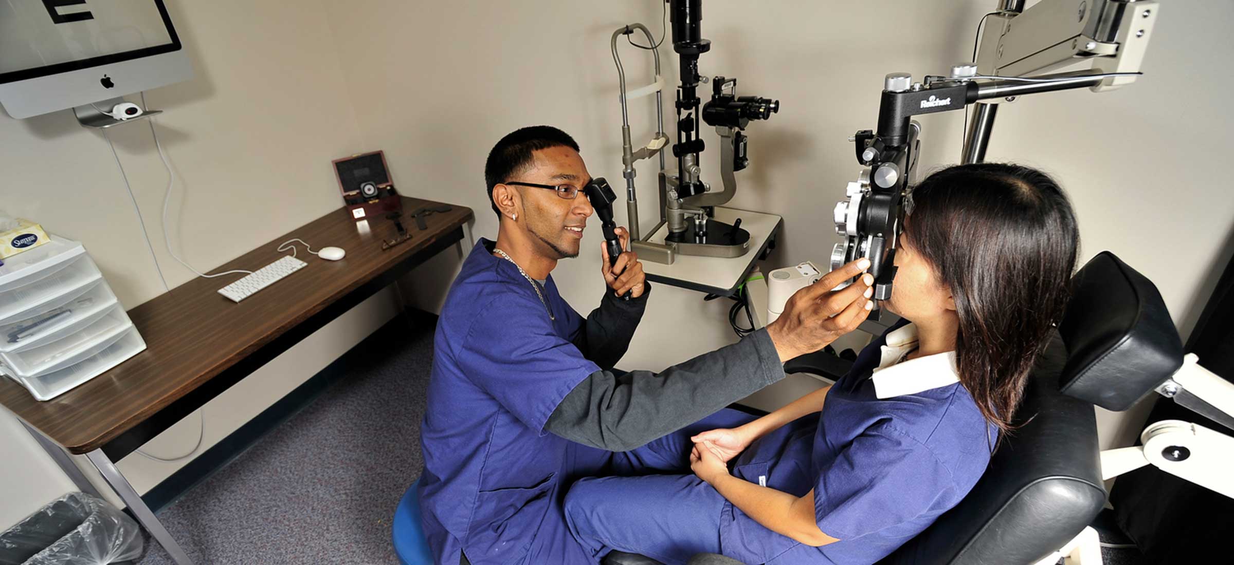 Eye Care Technology student performing an exam