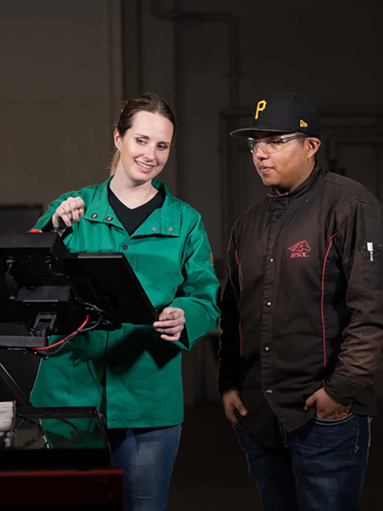Students reviewing equipment