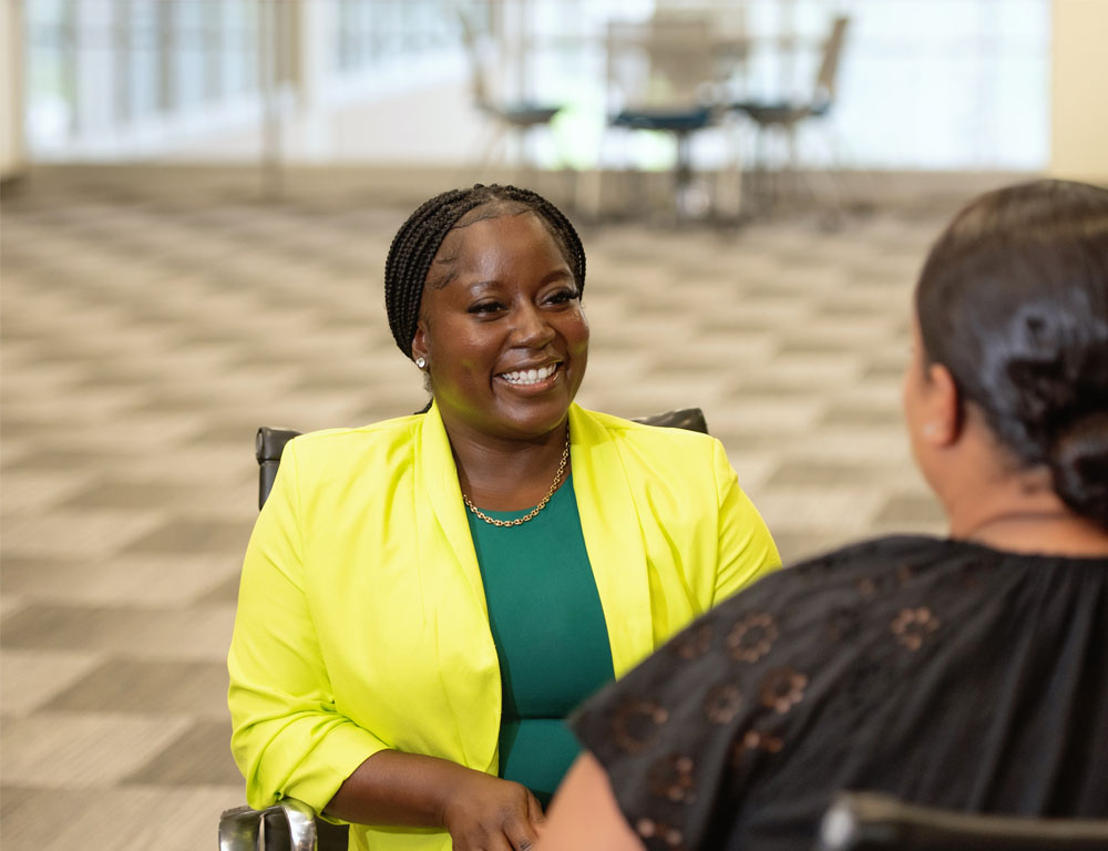 Mental Health Services provider holding the hand of a patient