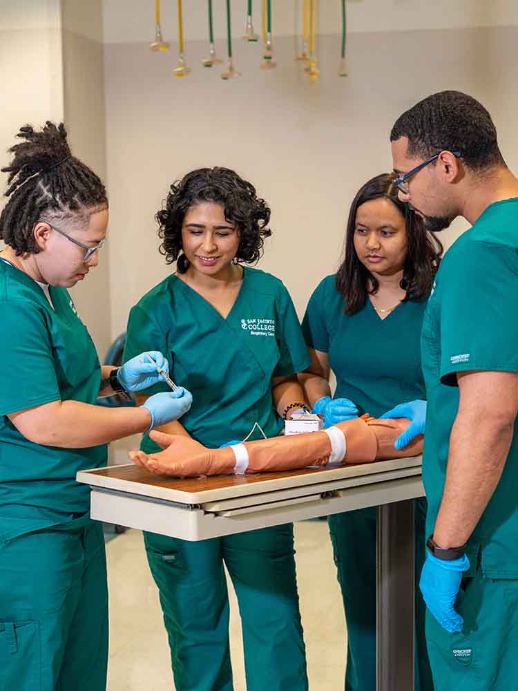 respiratory care therapists working on arm